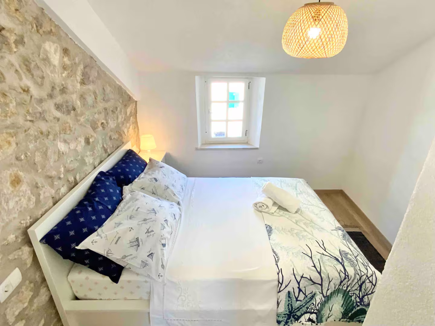 Bedroom with Stone Wall